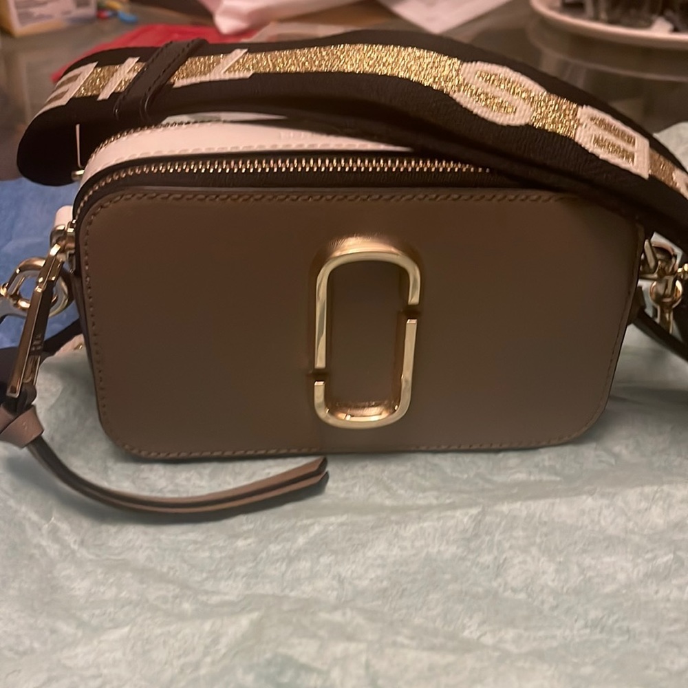 Brand new Marc Jacob cross body bag in beige and only worn once